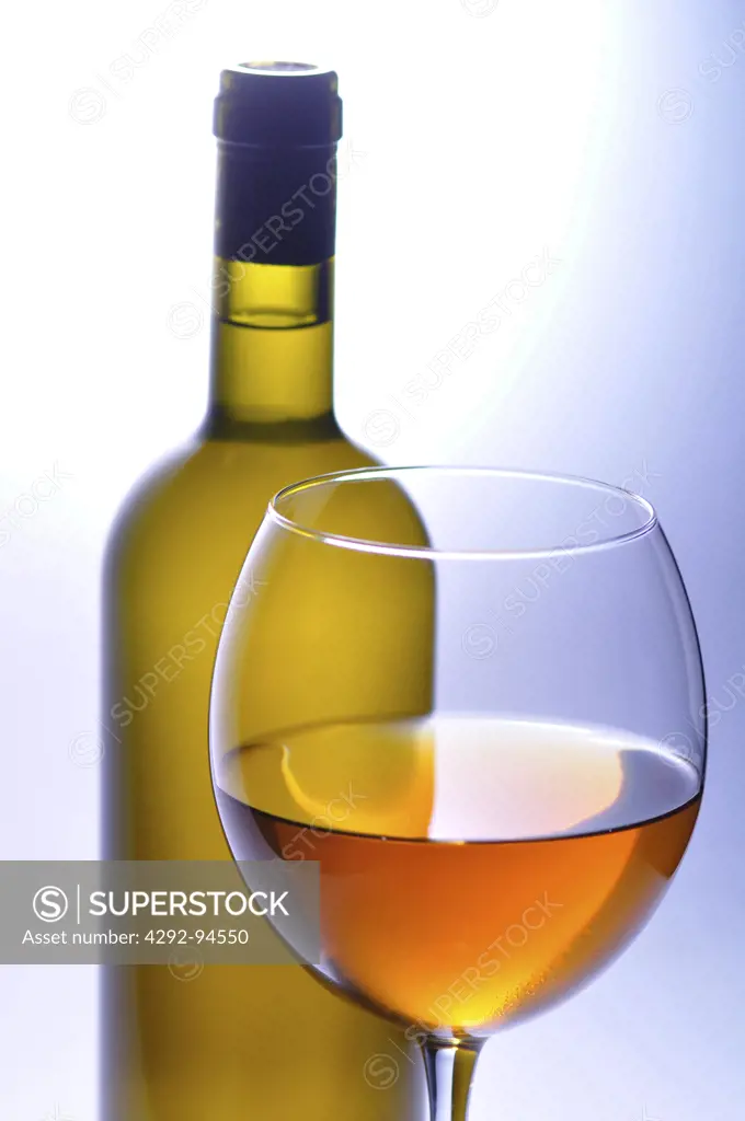 A Glass of White Wine background Bottle