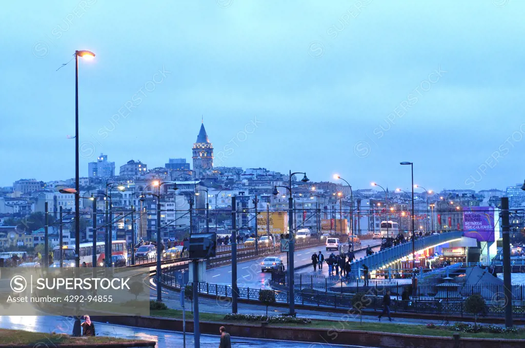Turkey, Istanbul, View of the Galata Tower and Galate Bridge on the Golden Horn at Dusk
