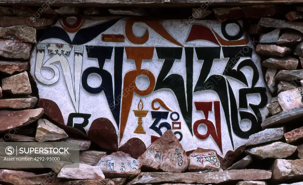 Eastern Tibet. Mani stones (prayer stones). Stones painted or engraved with buddhist images and mantra
