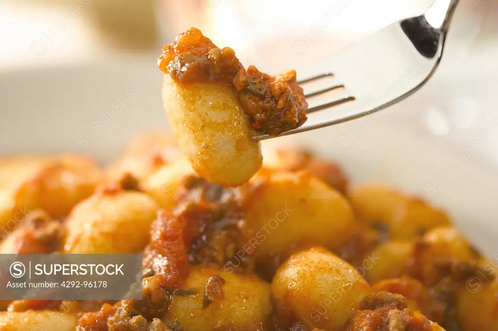 Pasta, gnocchi of potatoes with ragu Bolognese