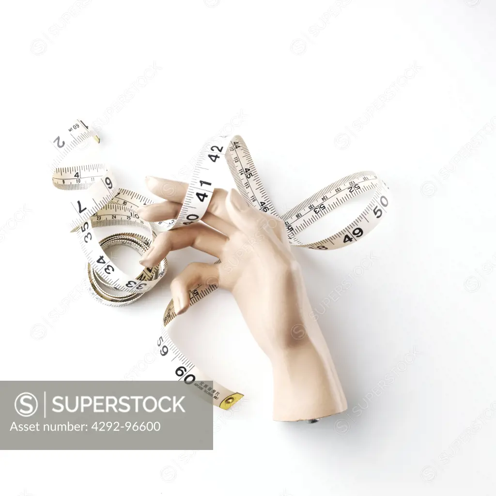Tape measure and mannequins hand