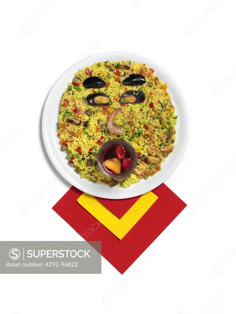 Paella on dish shaped as human face