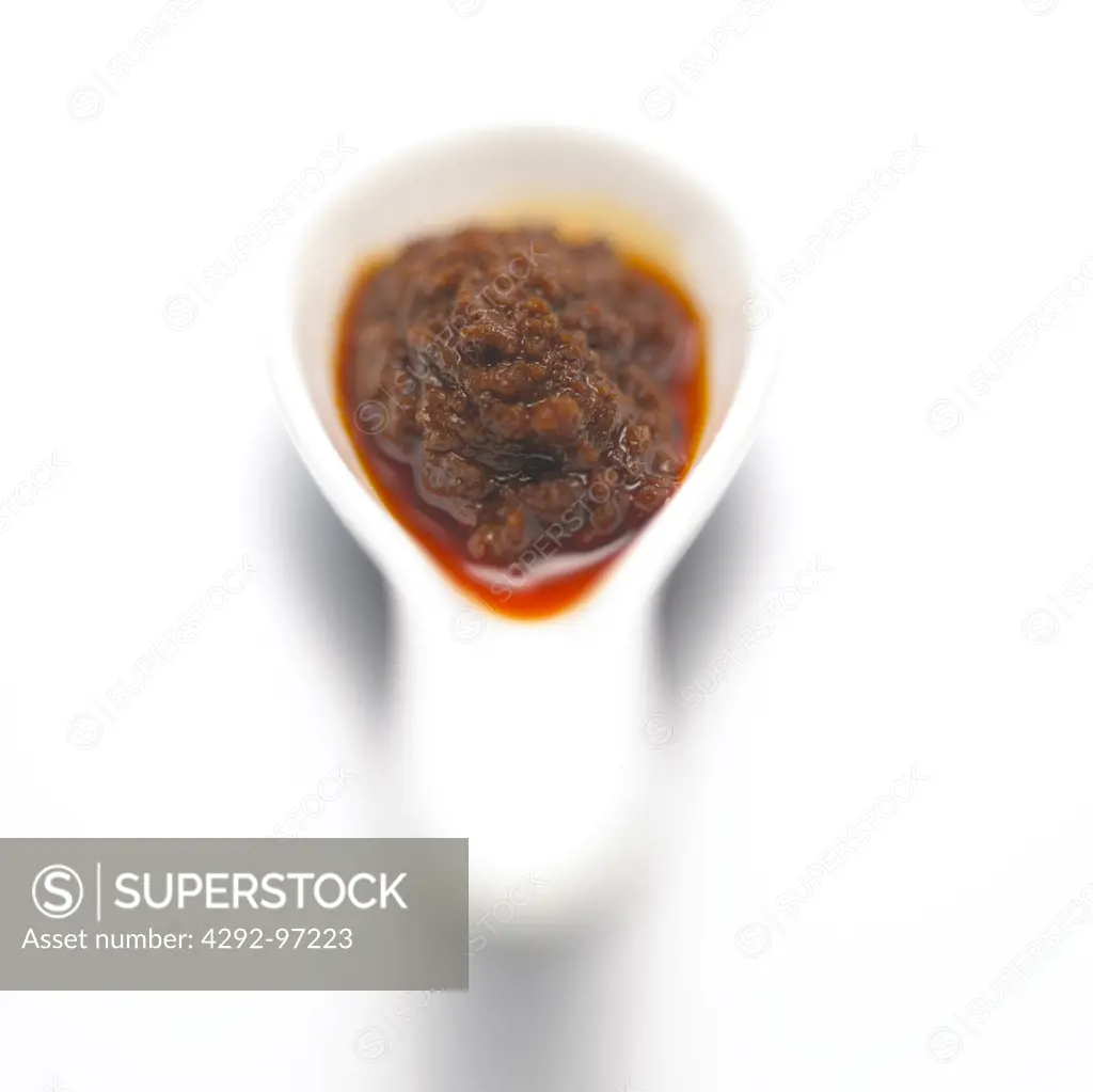 Spoon with chili salsa