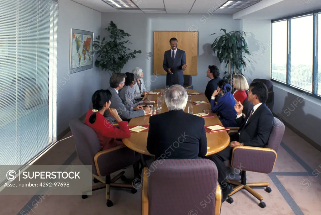 Multiethnic businessmen in boardroom meeting