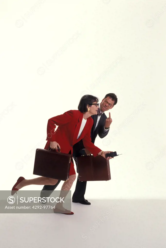 Businessman and woman tring to get ahead