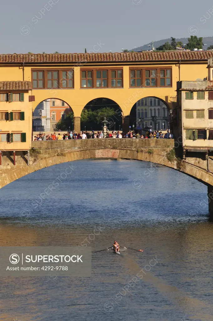 Italy, Tuscany, Florence, Arno River, Ponte Vecchio Bridge and Rowing Boat