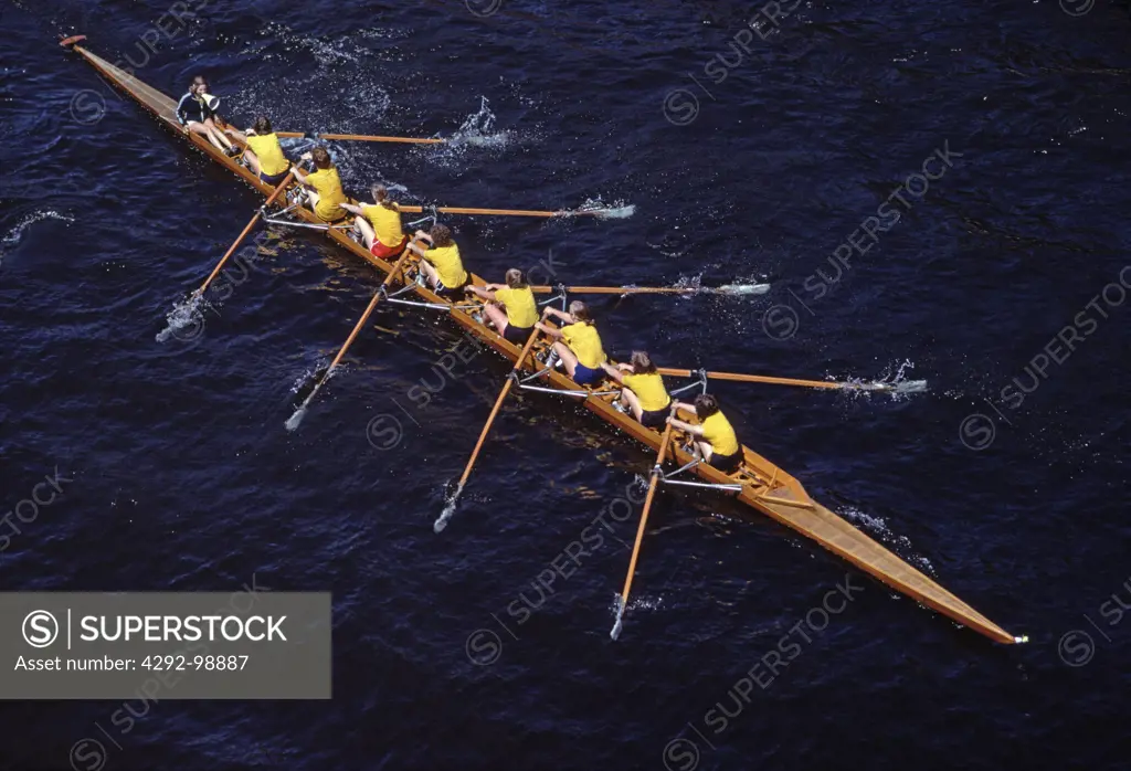 Female team rowing in a race, Washington, USA
