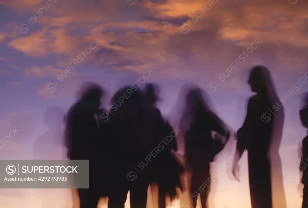 Silhouette of a group of teenagers
