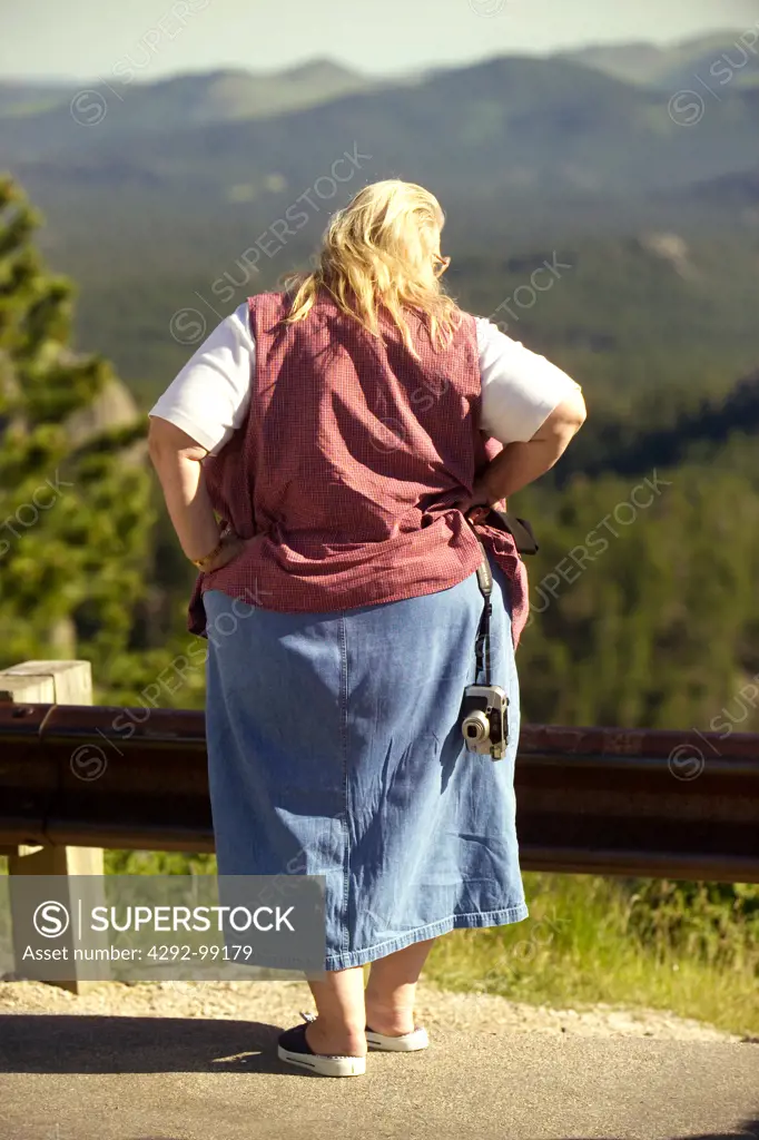 Overweight woman outdoors