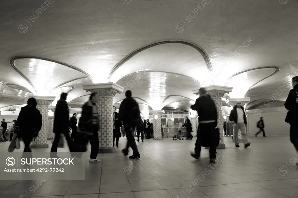 France, Paris, people walking in underground station