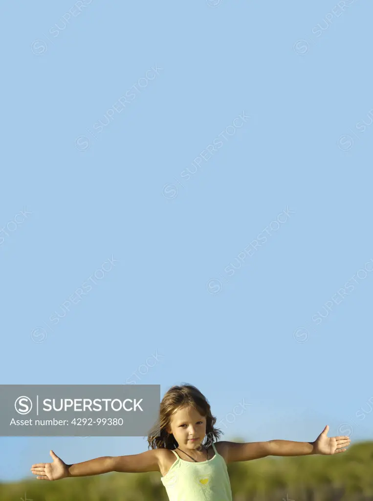 Girl with raised arms, Second Beach, Newport, Rhode Island, USA