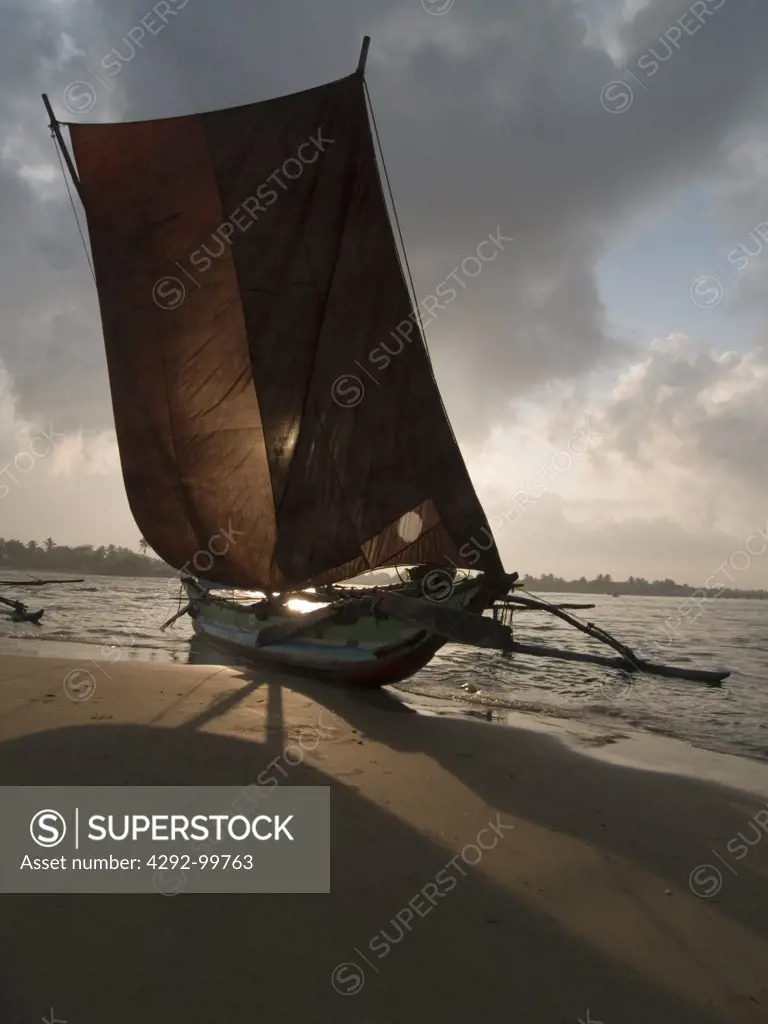 Sri Lanka, Negombo. Fishing boat on beach