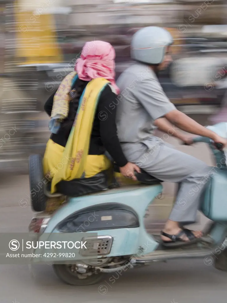 Two people on motorscooter Jodhpur, Rajasthan, India