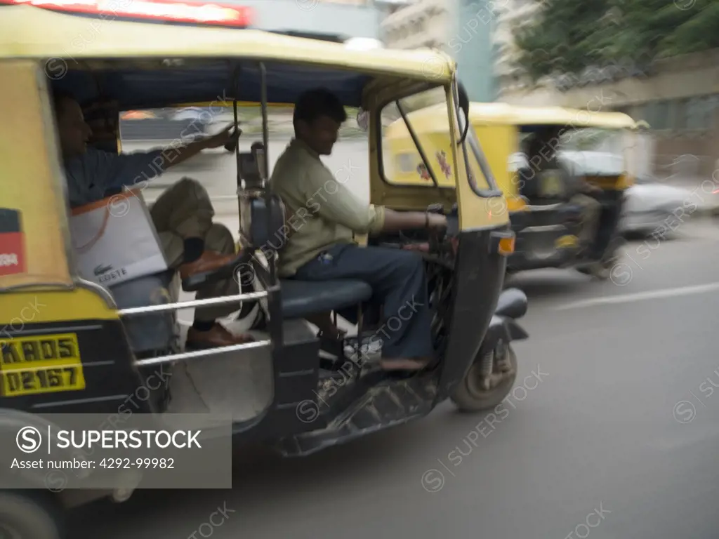 Auto rickshaw on the road in Bangalore, Karnataka, India