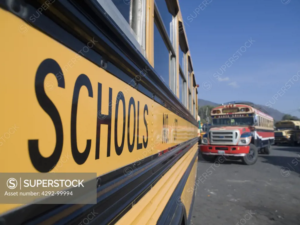Former American school buses reused in bus station in Antigua, Guatemala