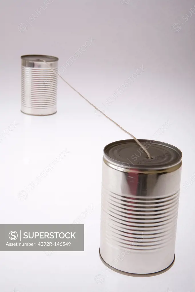 Two cans joined with string