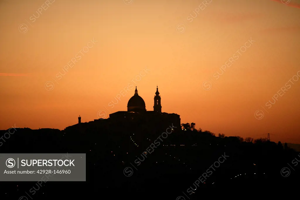 Italy, Marche, Loreto, cityscape at sunset