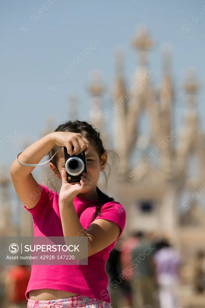 Girl with digital camera