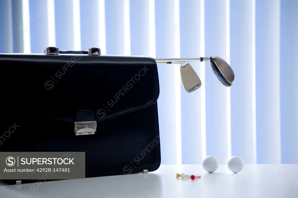 Briefcase with golf clubs