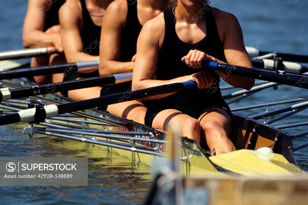 Detail of women's fours rowing team in action