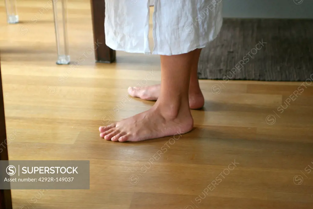 Woman with barefoot, low section
