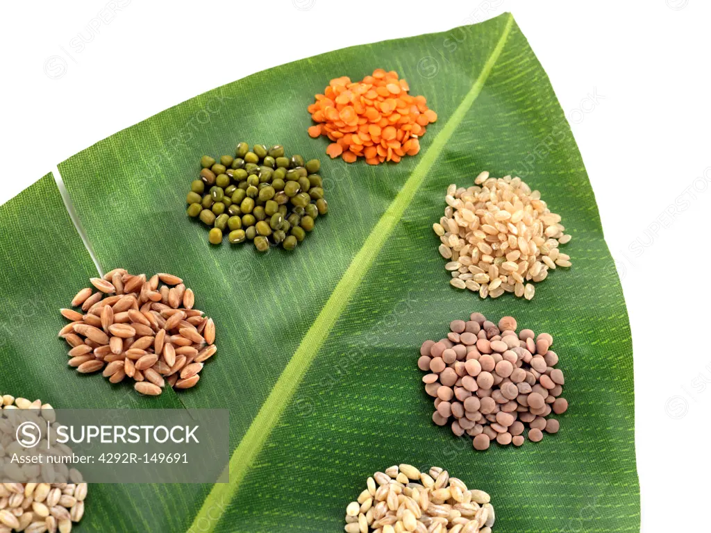 Cerals and legumes on a banana leaf