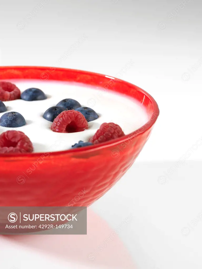 Yoghurt bowl with raspberries and blueberries