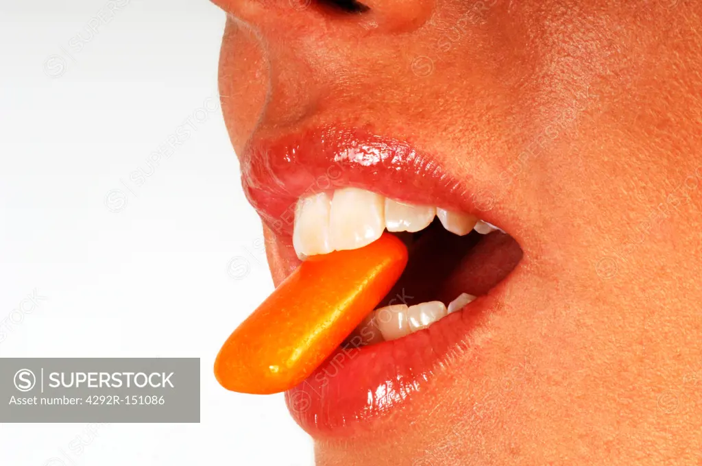 Close up of woman's mouth Woman eating a chewing gum