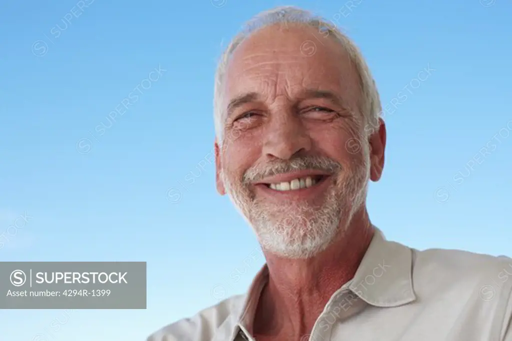 Happy mature man outdoors