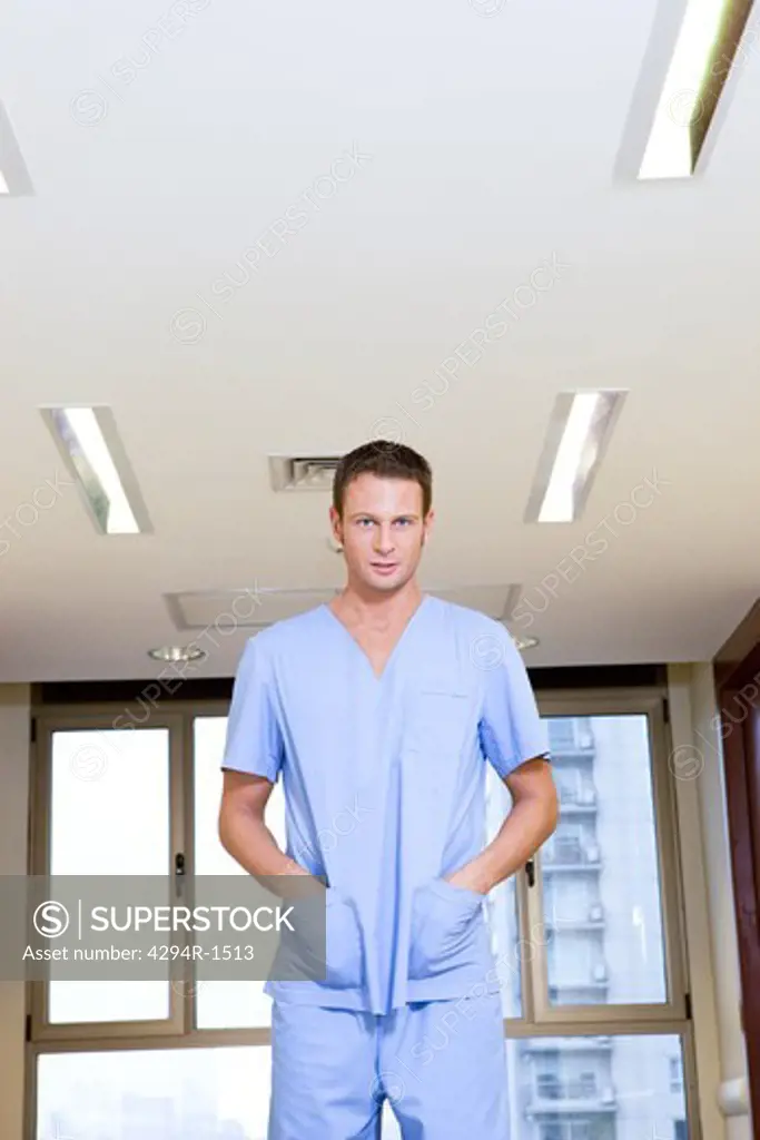 Male nurse on hospital corridor