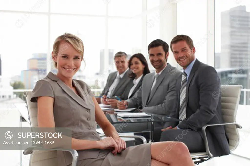 Businesswoman at meeting in conference room