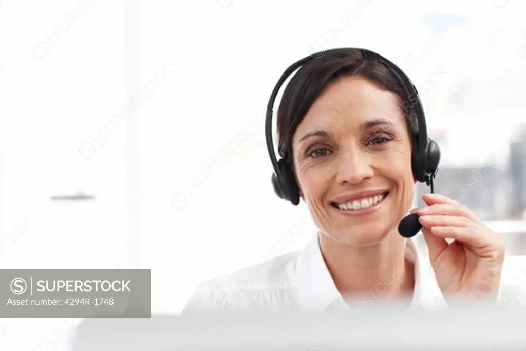 Customer service representative wearing headset