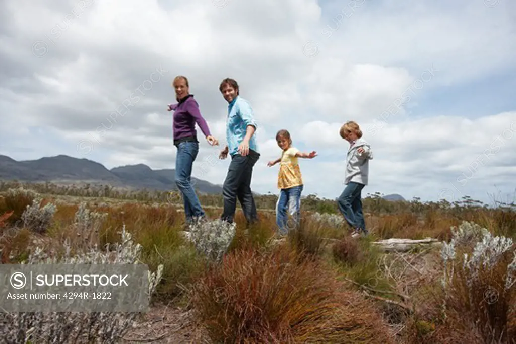 Family hiking in remote landscape