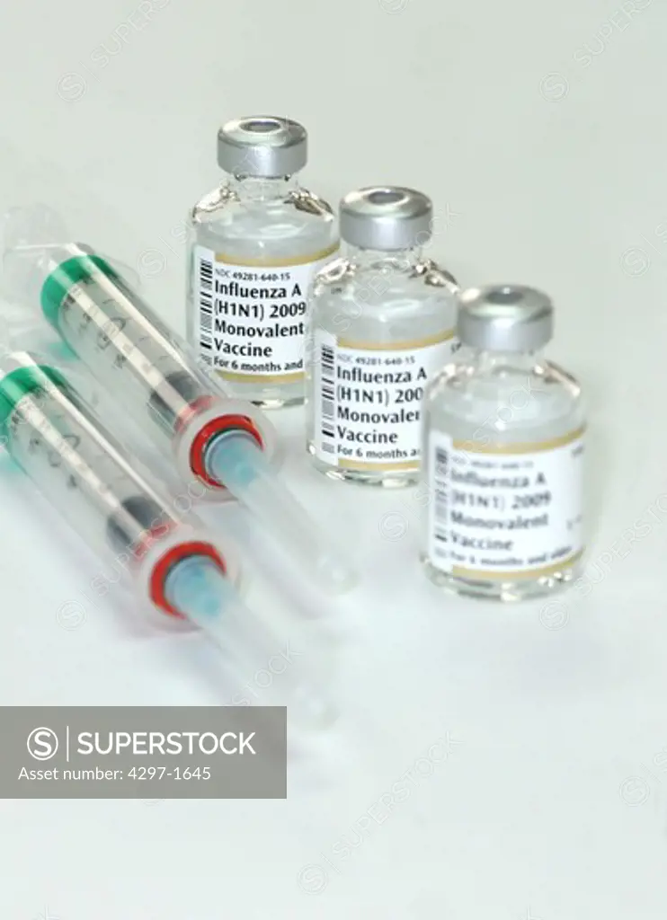 H1N1 flu vaccine vials and syringes