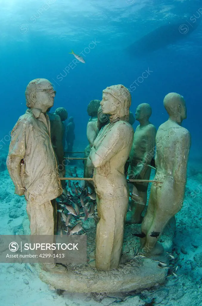 Mexico, Cancun, Sculptures at bottom of sea in Cancun Underwater Museum in Caribbean Sea