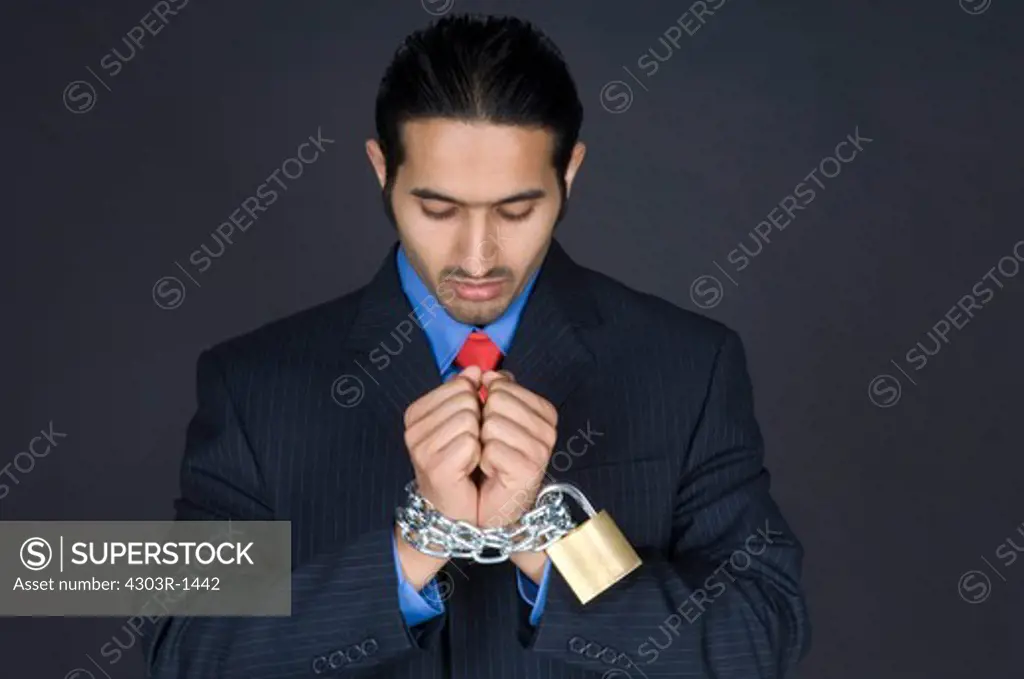 Businessman with tied hands