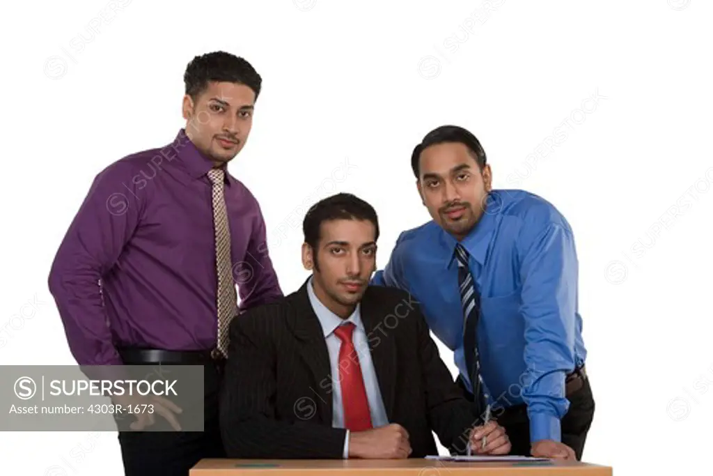 Business people against white background, portrait