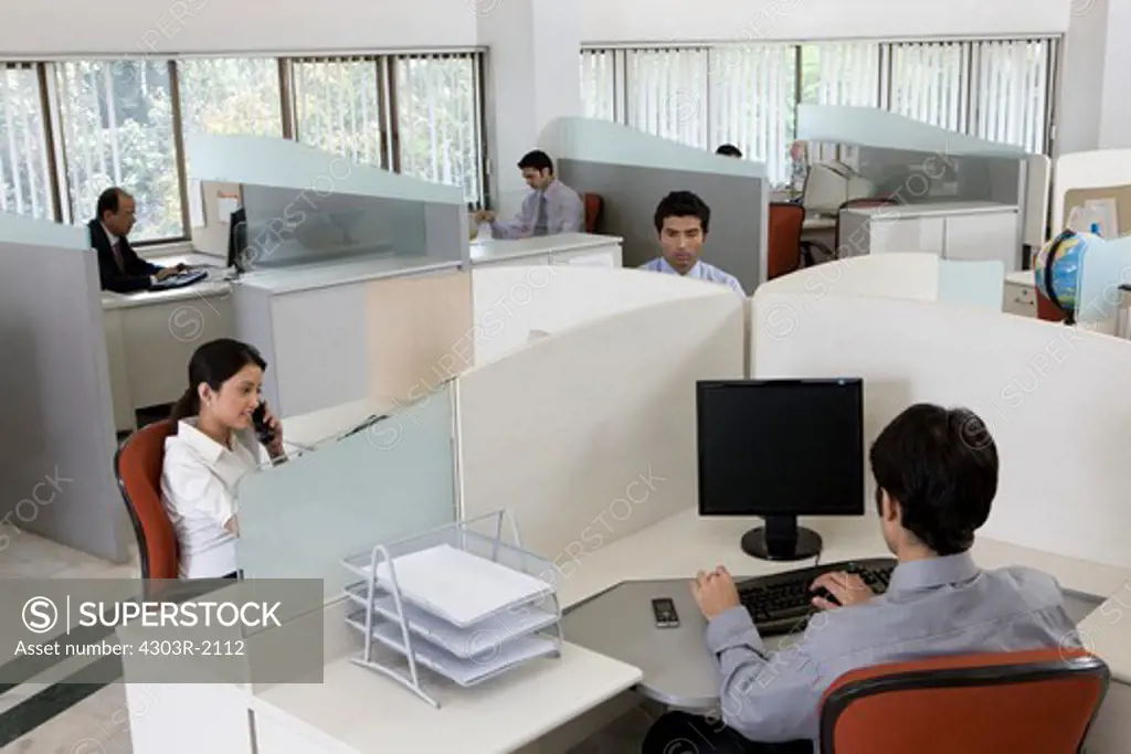 Businesspeople working in office