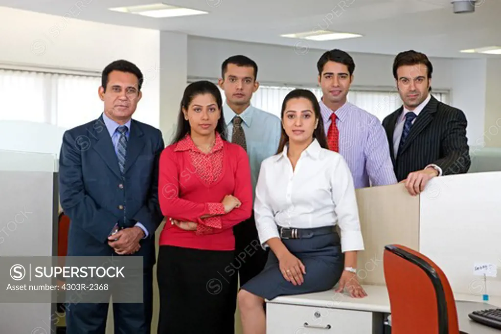 Group of businesspeople looking at the camera, portrait