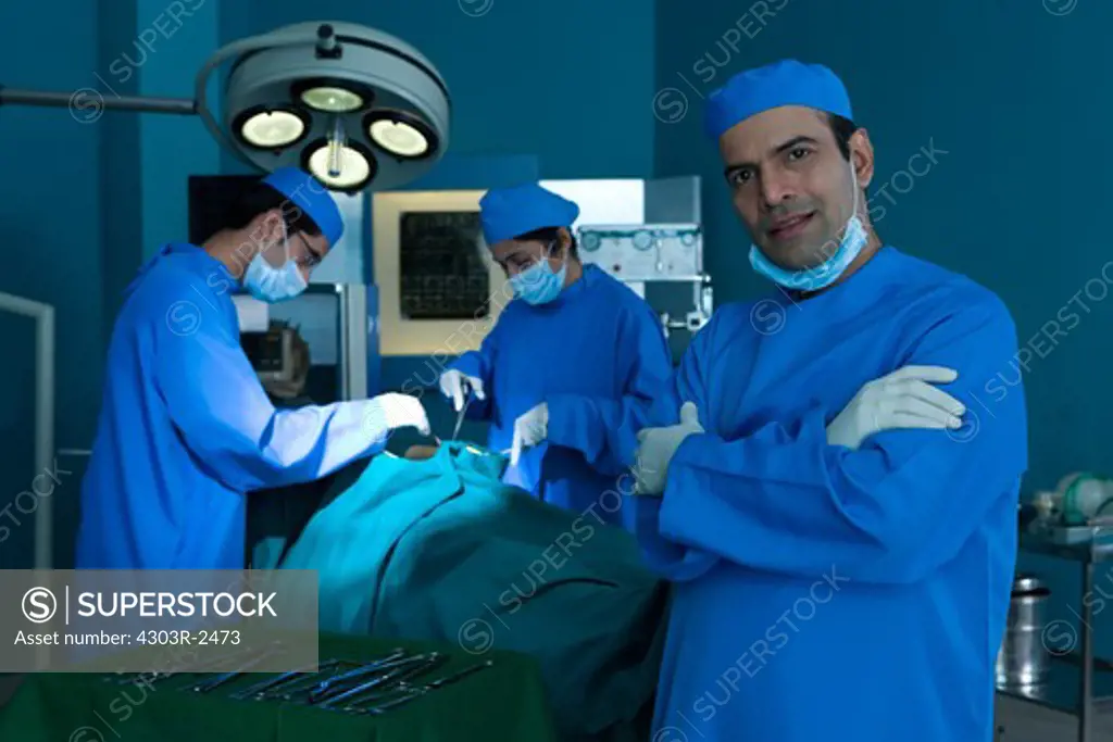 Confident male surgeon in the operating room