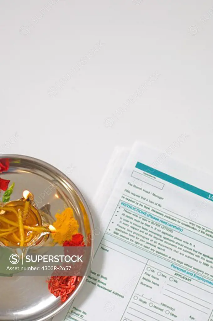Platter of indian offerings and loan application form