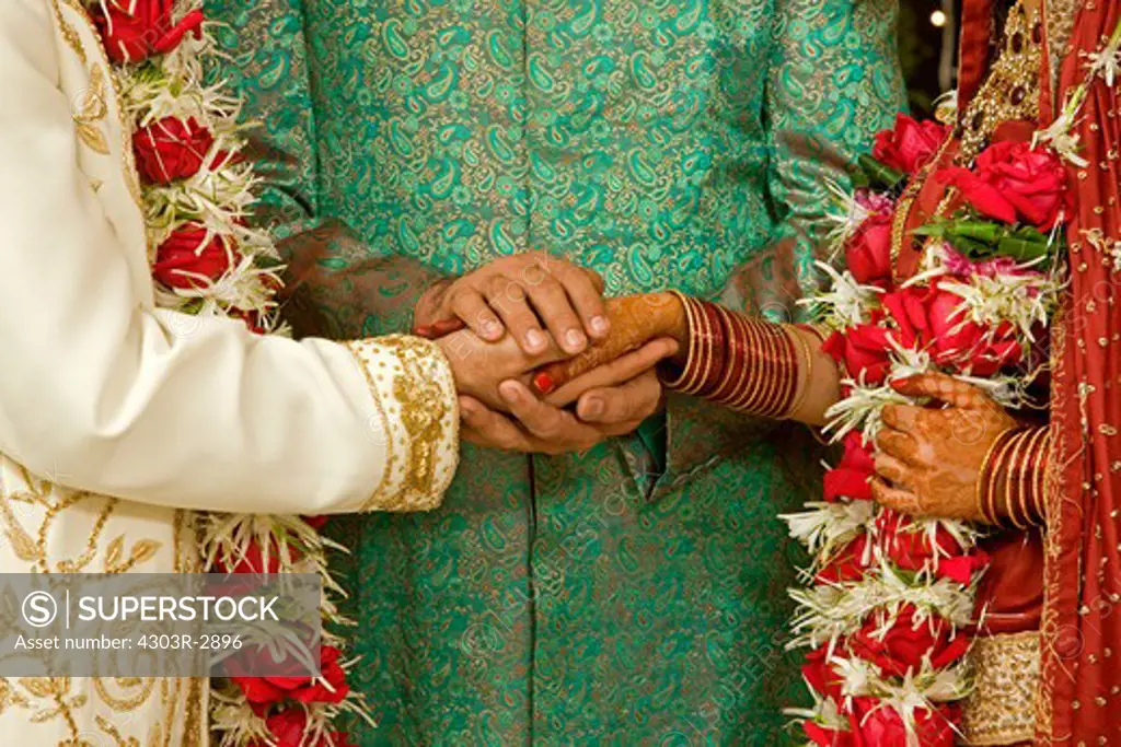 Indian man showing support to the newly wed couple