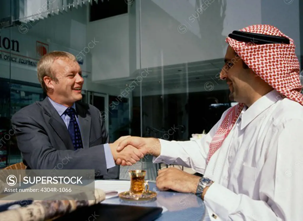 Multi Ethnic Businessmen shaking hands