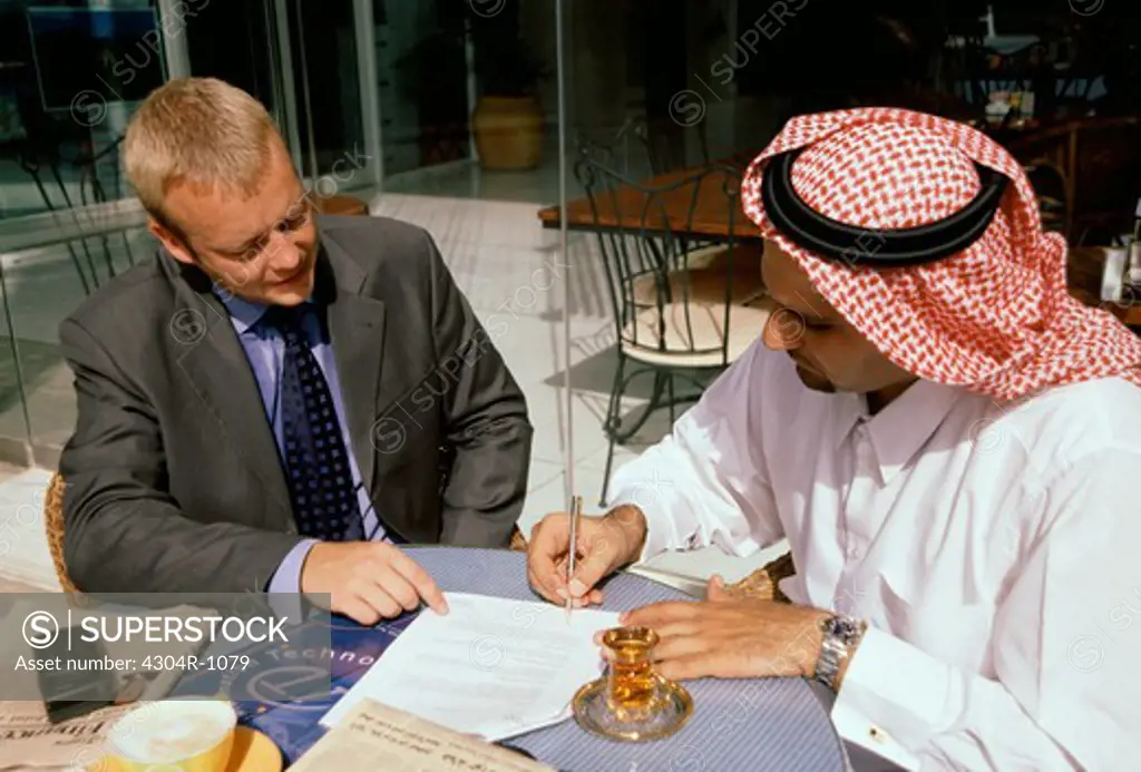 Businessmen Signing an agreement