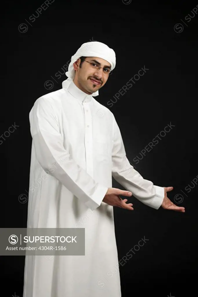 Arab man showing something