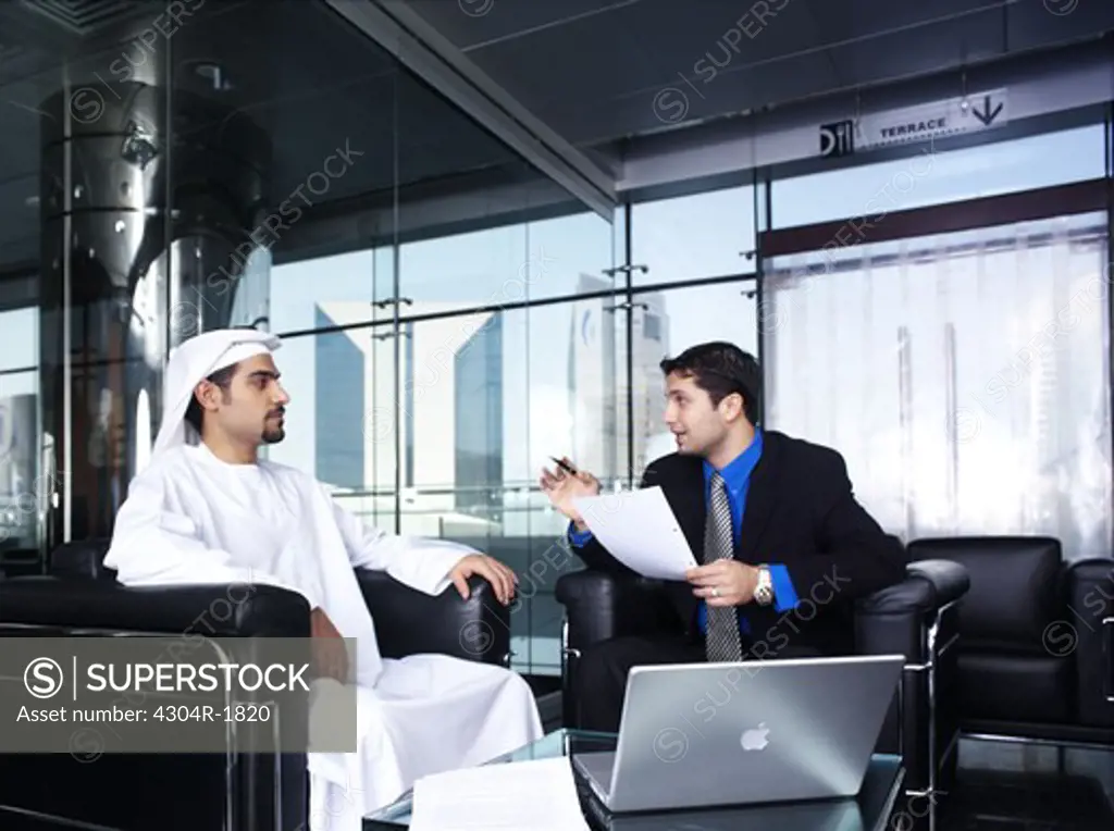 Business persons discussing