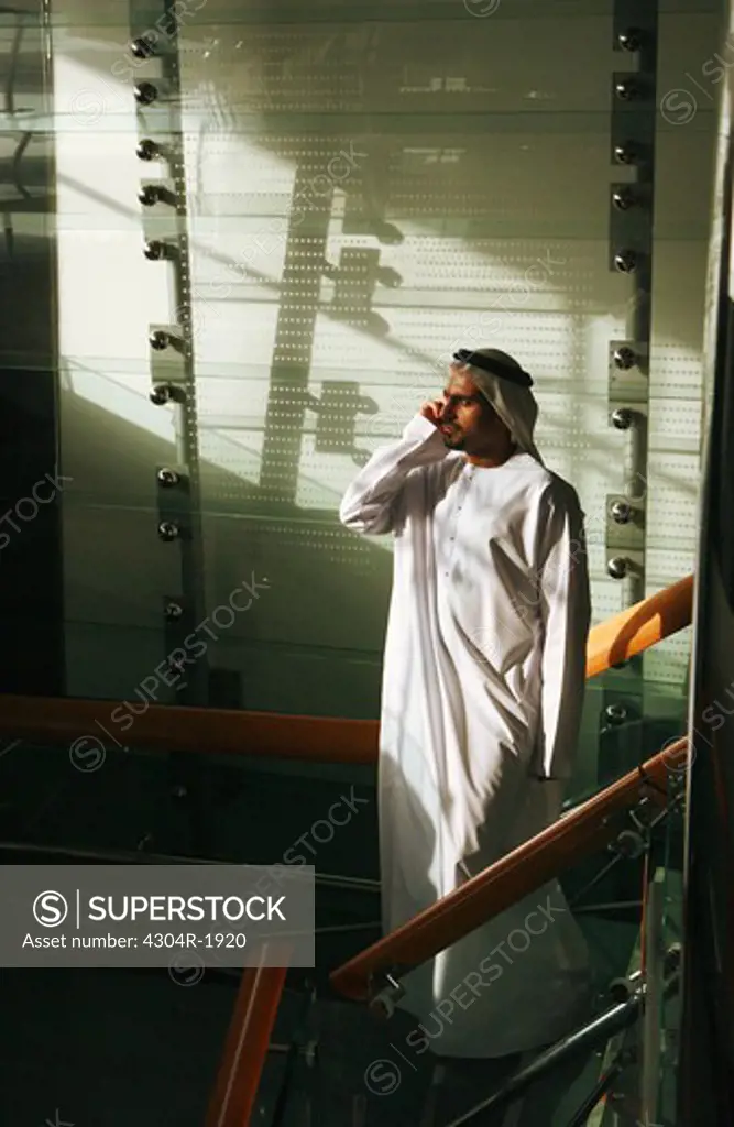Arab Man busy on the phone.