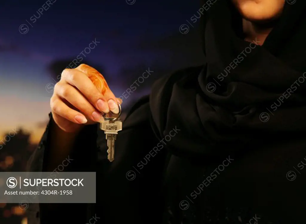 Arab Lady holding key