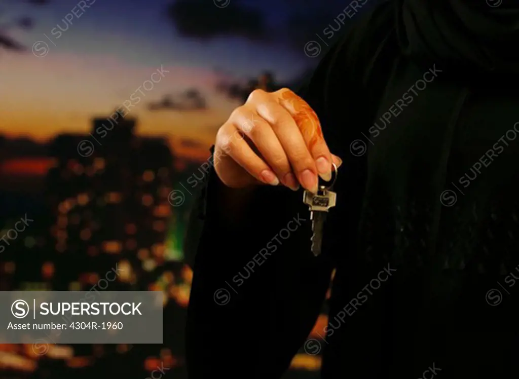 Arab Lady holding key