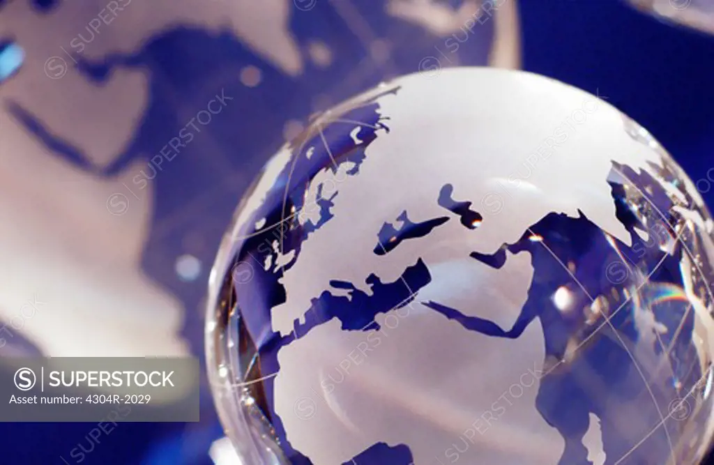 Two World globes (focus on globe in foreground)